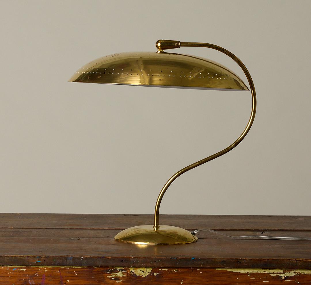 MID CENTURY BRASS LAMP IN THE MANNER OF GERALD THURSTON