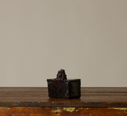 BLACK CERAMIC FIGURE BOX WITH BUST