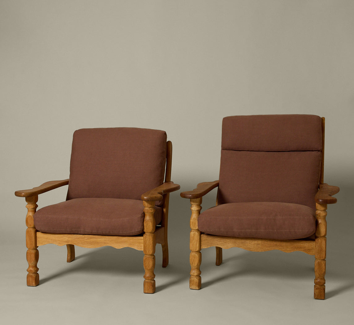 PAIR OF 1960S DANISH “HIS AND HERS” OAK LOUNGE CHAIRS IN THE STYLE OF HENNING KJAERNULF