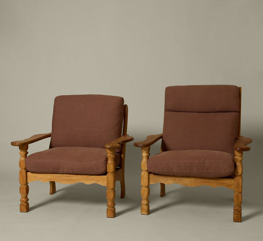 PAIR OF 1960S DANISH “HIS AND HERS” OAK LOUNGE CHAIRS IN THE STYLE OF HENNING KJAERNULF