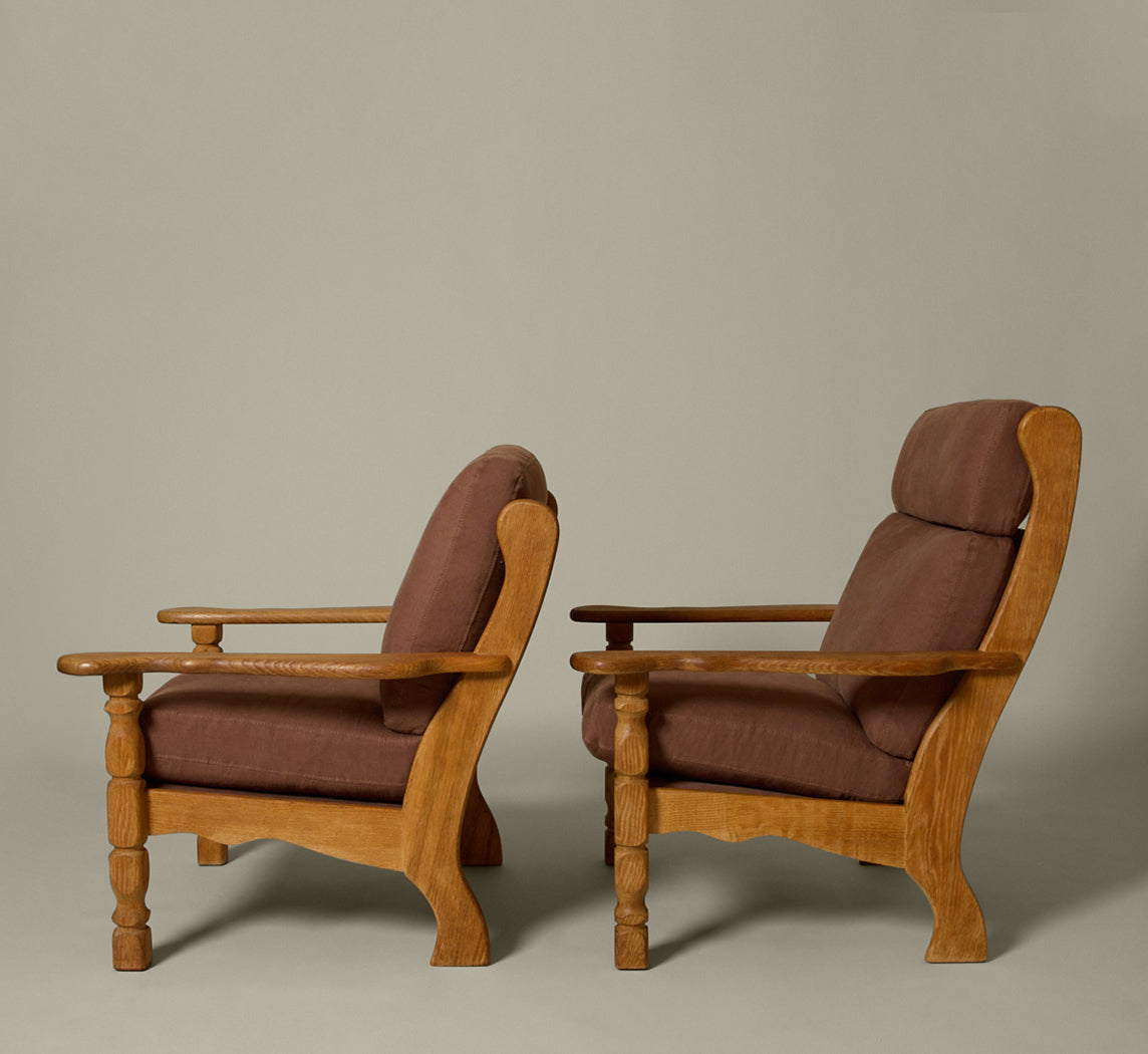 PAIR OF 1960S DANISH “HIS AND HERS” OAK LOUNGE CHAIRS IN THE STYLE OF HENNING KJAERNULF