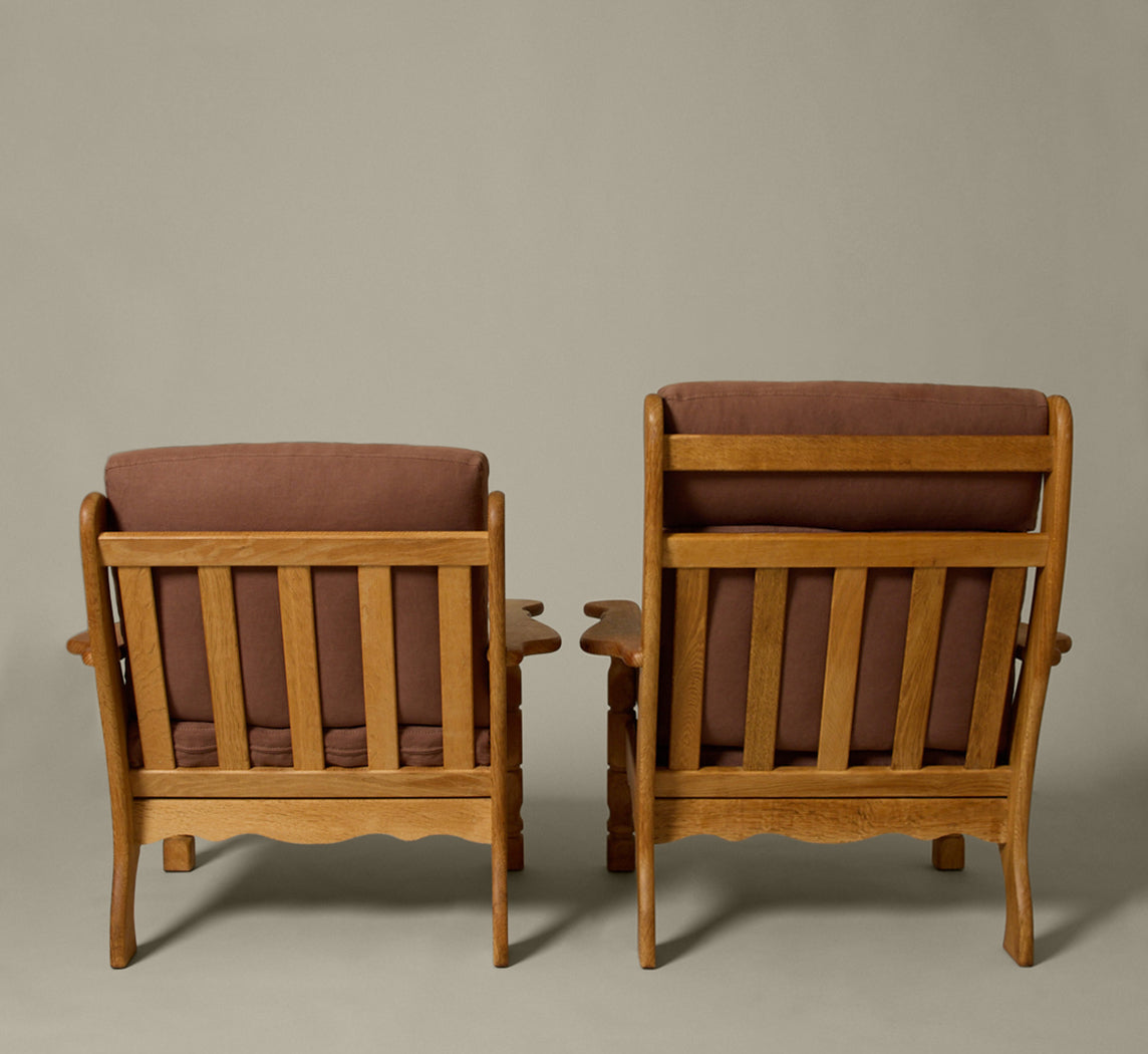 PAIR OF 1960S DANISH “HIS AND HERS” OAK LOUNGE CHAIRS IN THE STYLE OF HENNING KJAERNULF