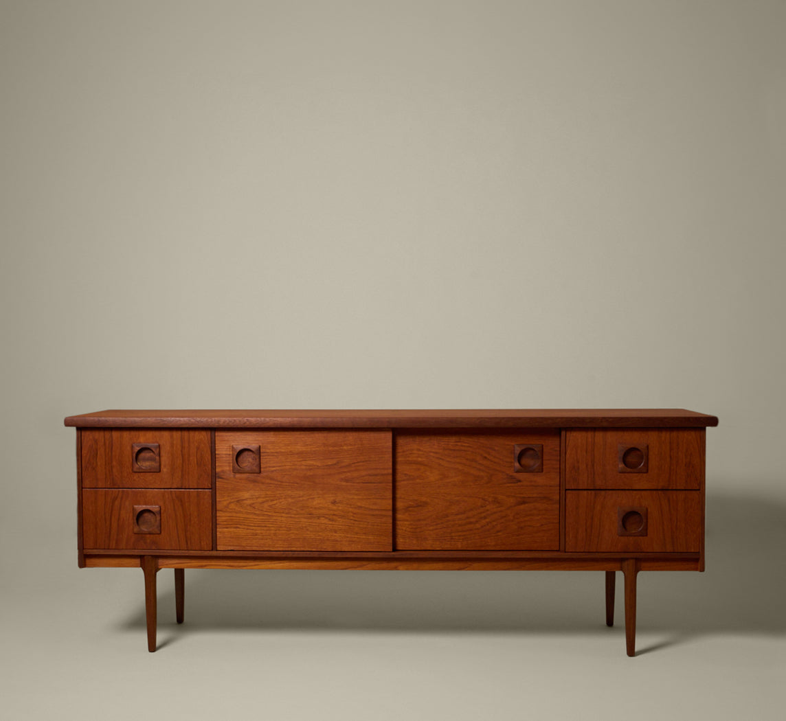 MIDCENTURY ENGLISH TEAK SLIDING DOOR SIDEBOARD
