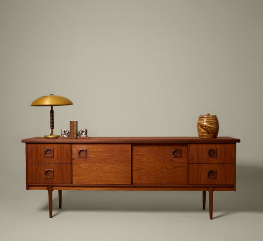 MIDCENTURY ENGLISH TEAK SLIDING DOOR SIDEBOARD