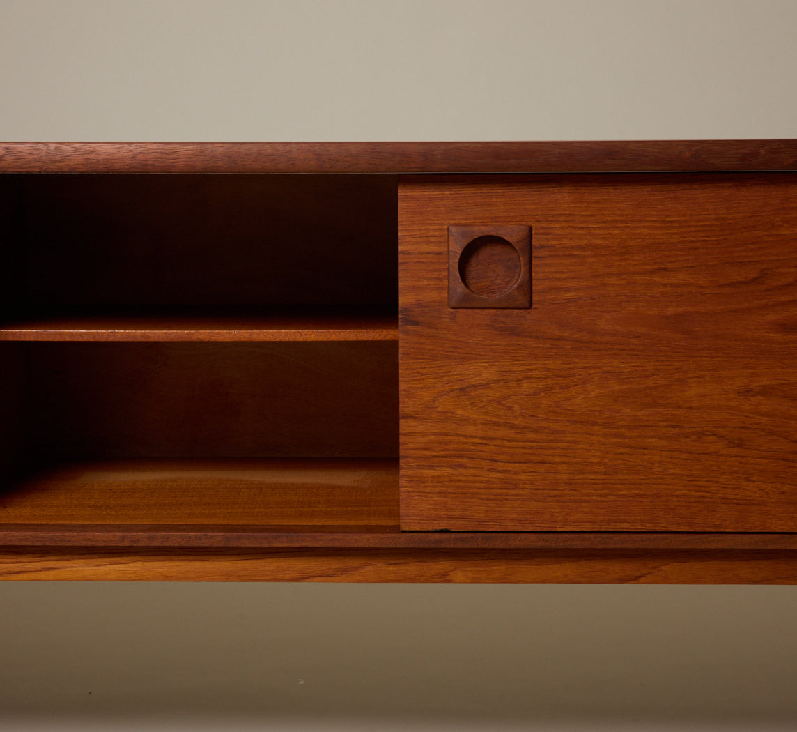 MIDCENTURY ENGLISH TEAK SLIDING DOOR SIDEBOARD