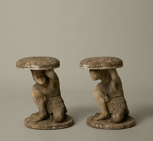 PAIR OF MID CENTURY FRENCH FIGURAL CAST STONE GARDEN TABLE WITH STONE AGGREGATE TOPS