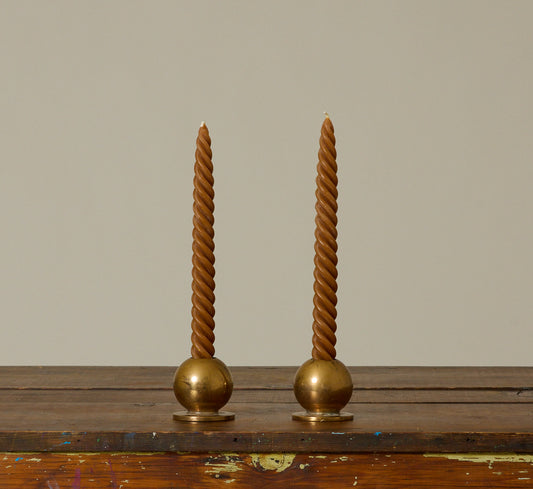 PAIR OF HEAVY DANISH MIDCENTURY BRASS ORB CANDLESTICK HOLDERS