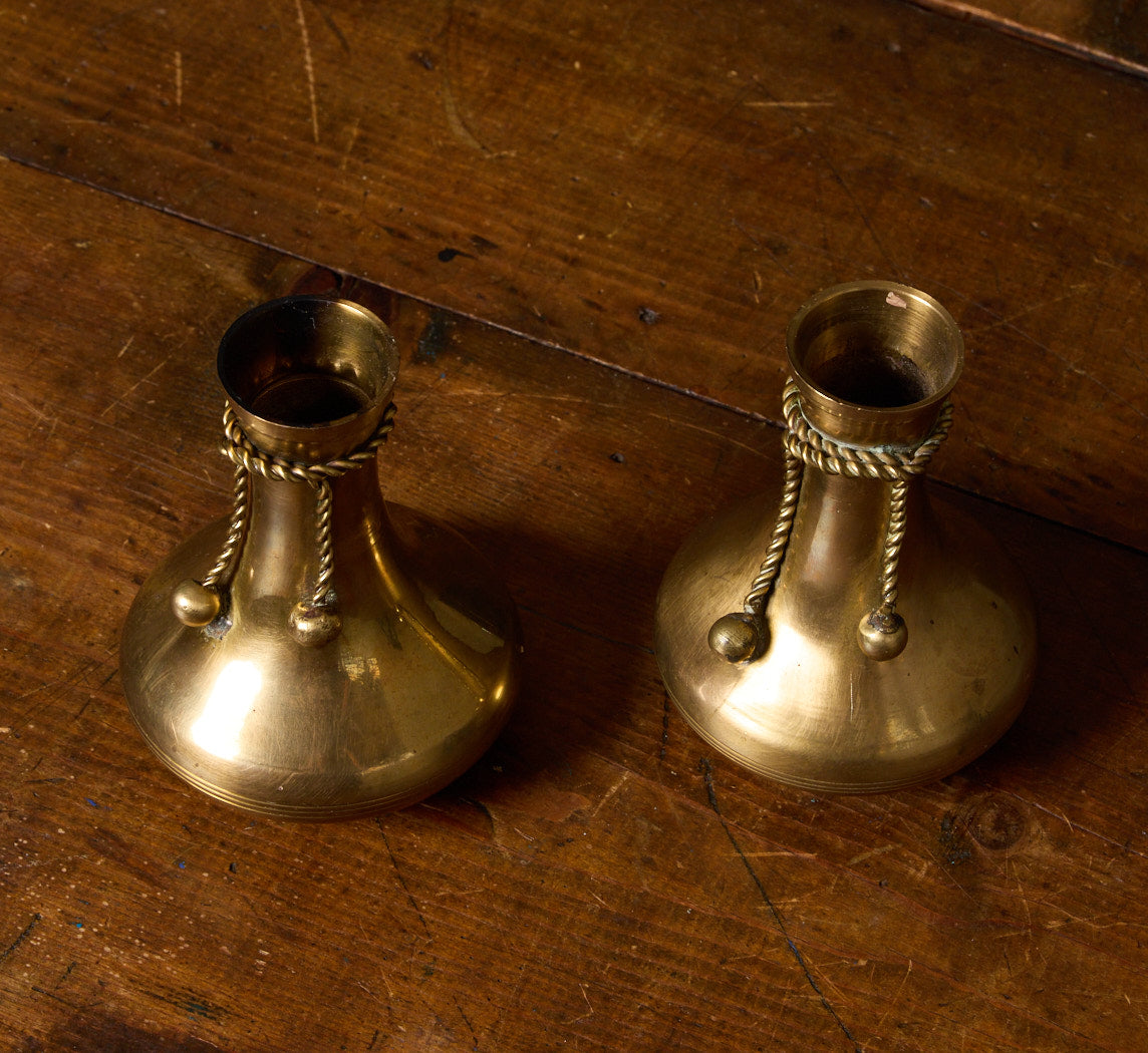 PAIR OF VINTAGE BRASS CANDLESTICK HOLDERS WITH ROPE TASSELS