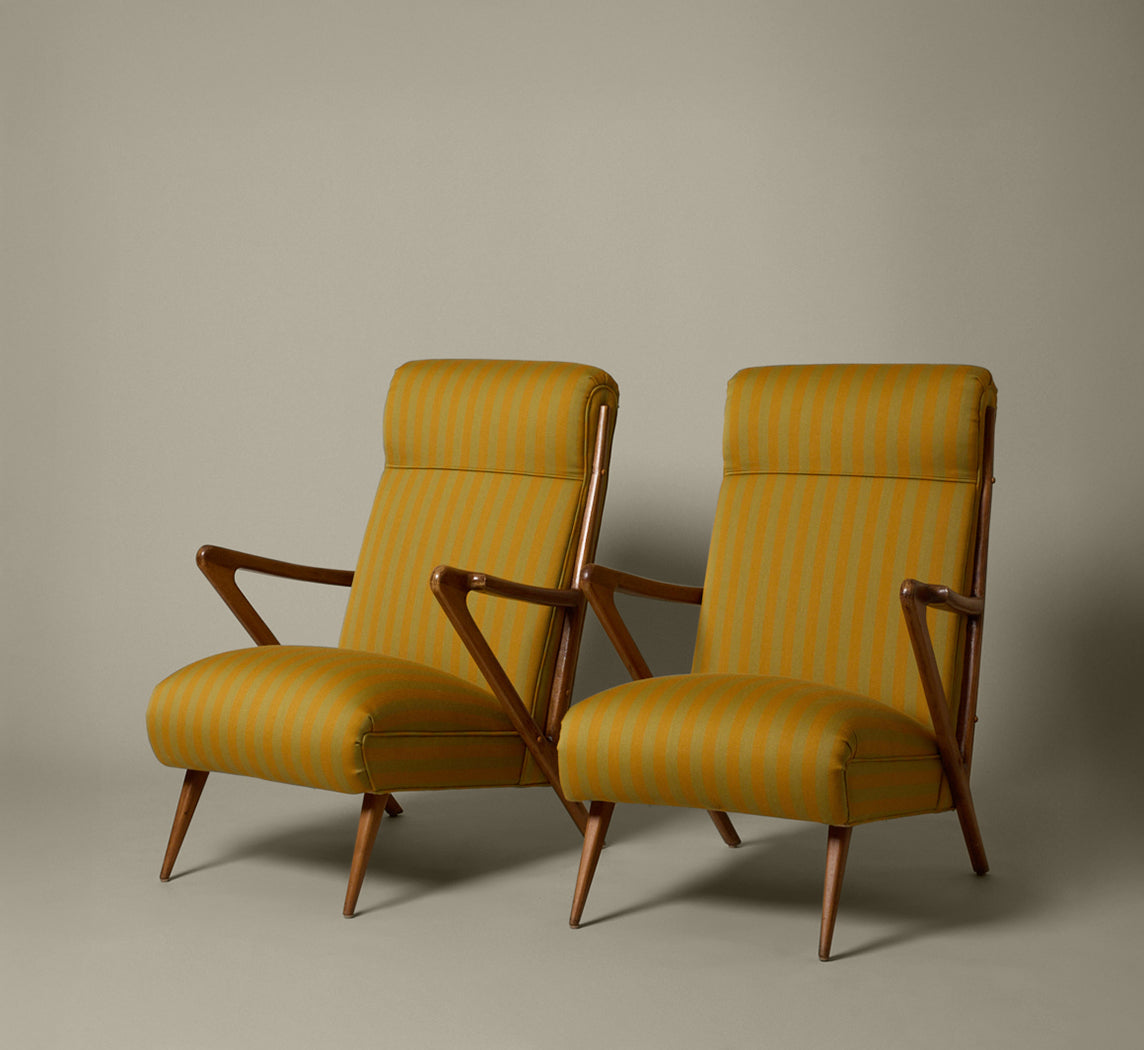 PAIR OF 1950S ITALIAN SCULPTURAL WALNUT UPHOLSTERED LOUNGE CHAIRS IN MAHARAM STRIPE