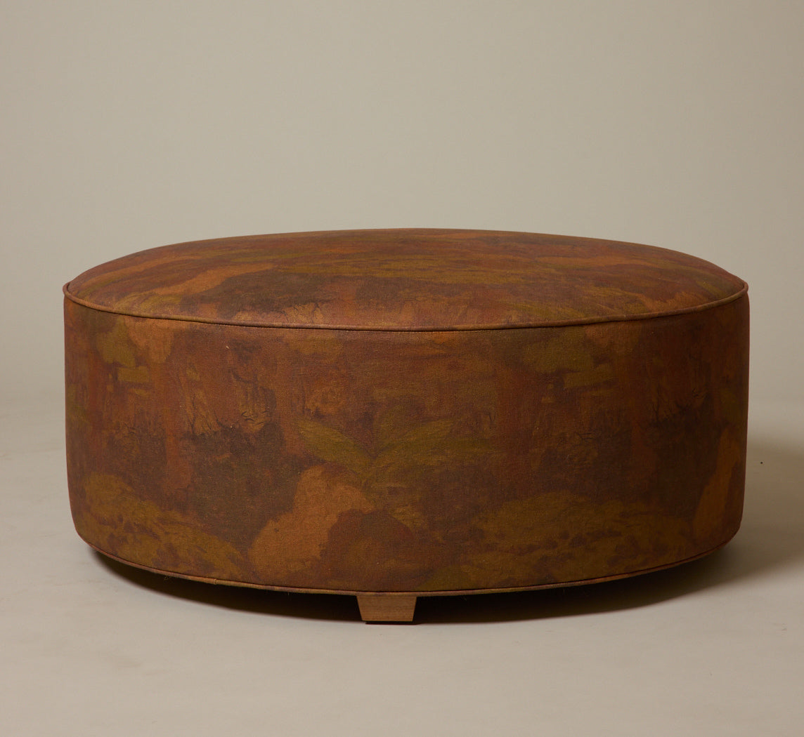 PIERCE & WARD CIRCLE OTTOMAN IN PAINTING LINEN