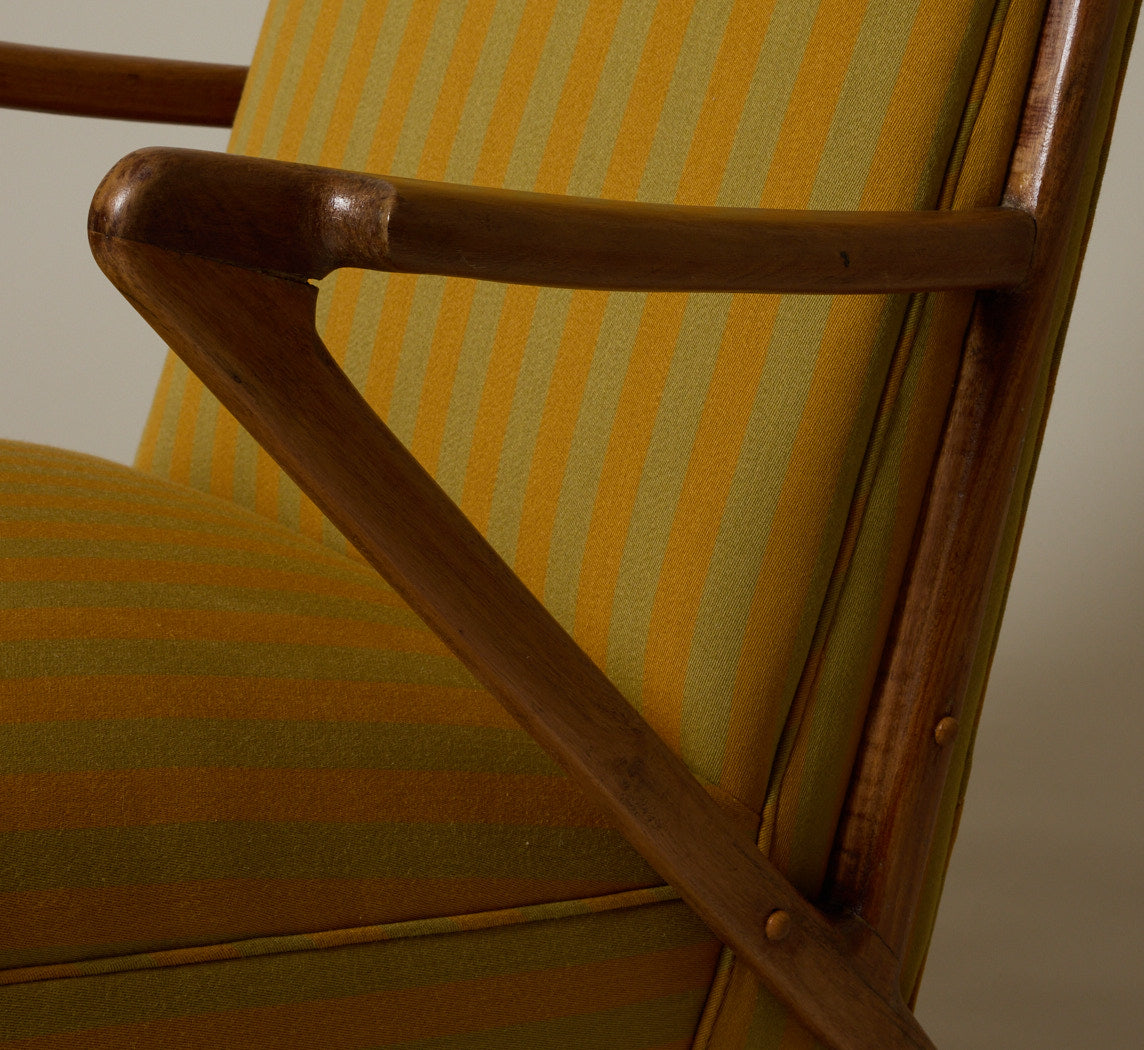 PAIR OF 1950S ITALIAN SCULPTURAL WALNUT UPHOLSTERED LOUNGE CHAIRS IN MAHARAM STRIPE