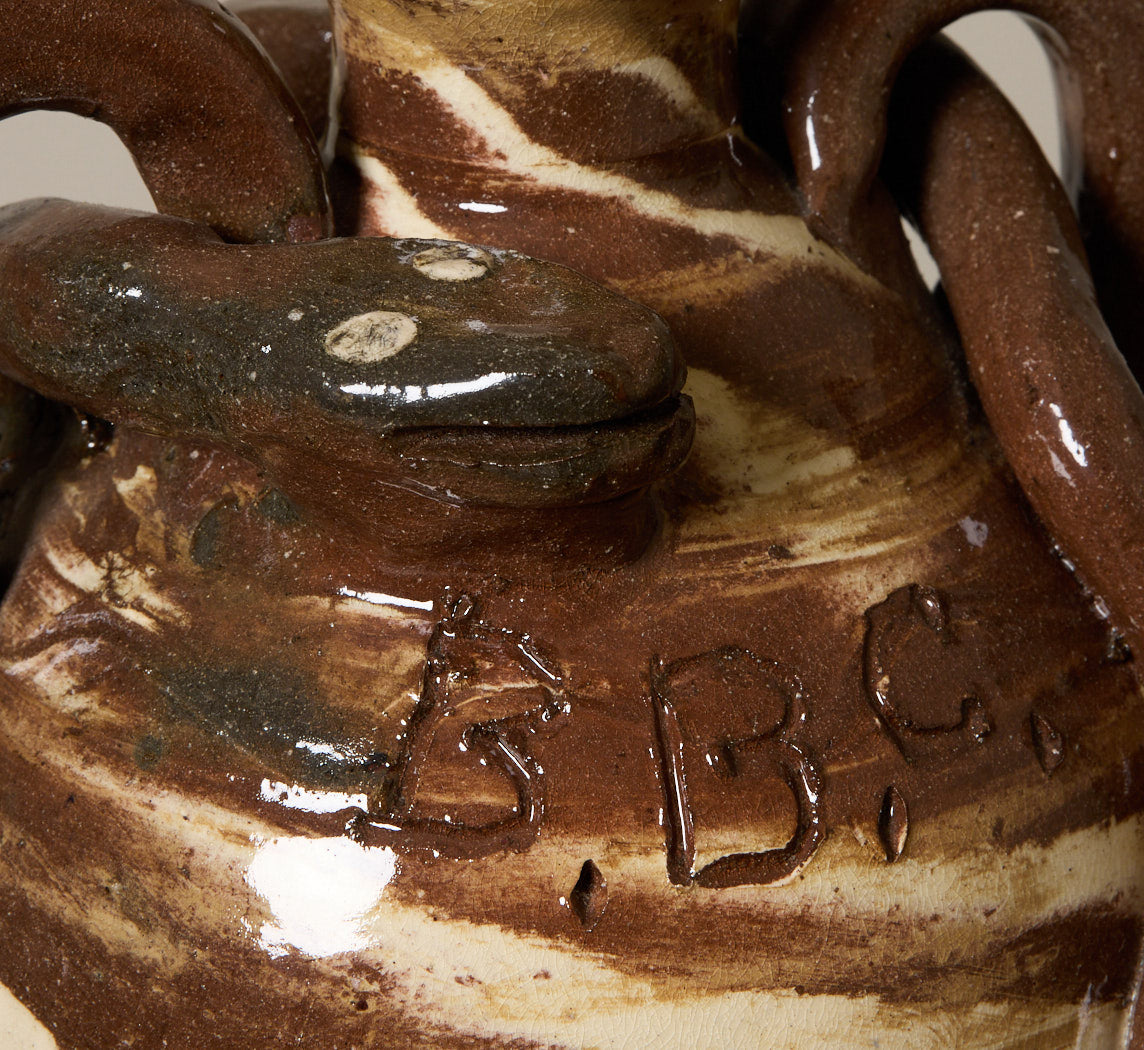 AMERICAN FOLK ART EARTHENWARE SWIRL SNAKE JUG