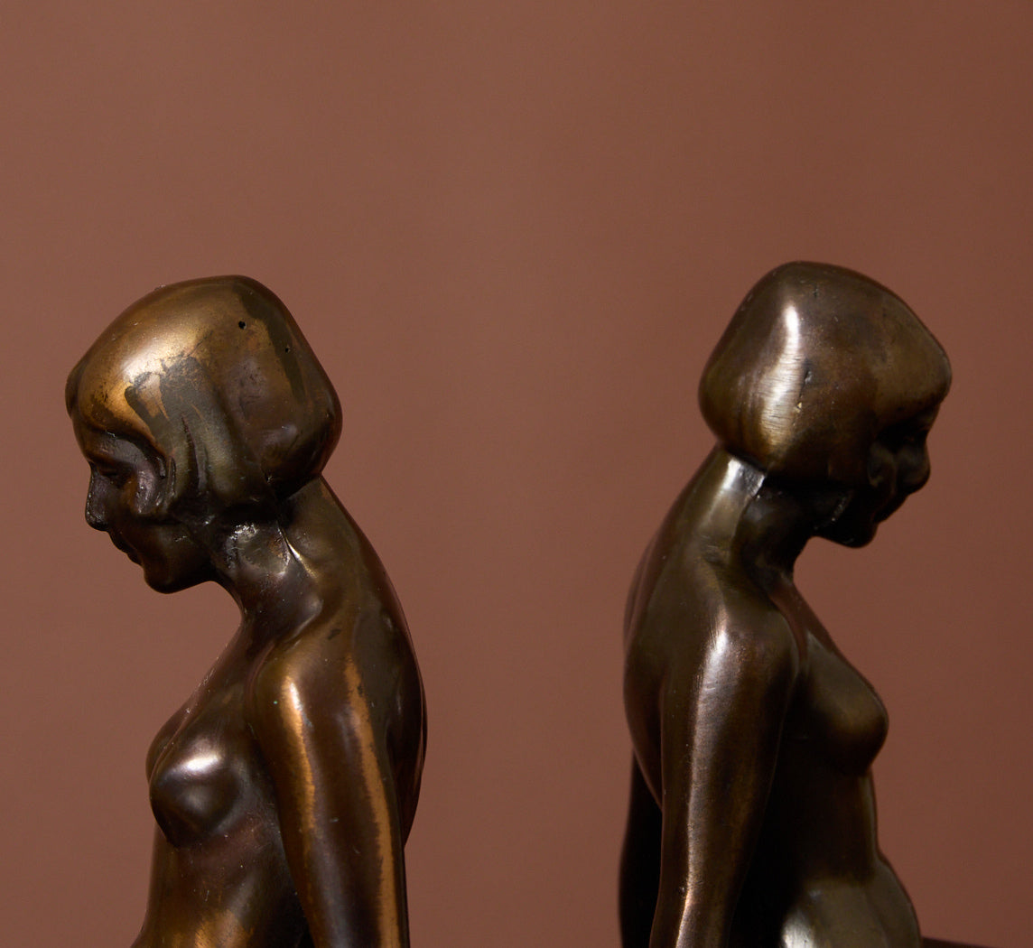 PAIR OF 1920S ART DECO BRONZE KNEELING NUDE BOOKENDS