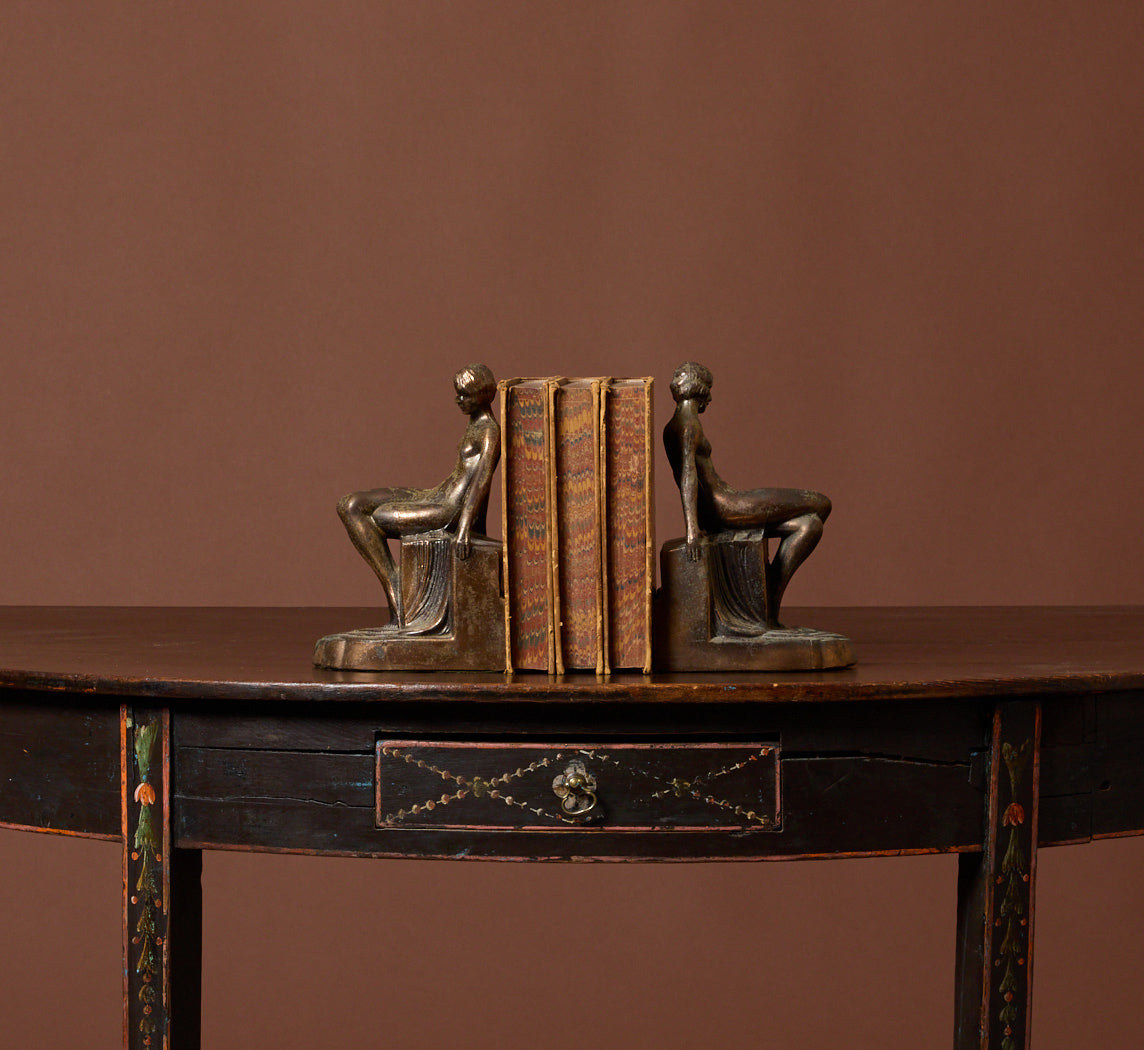PAIR OF 1920S ART DECO SPELTER SEATED NUDE BOOKENDS