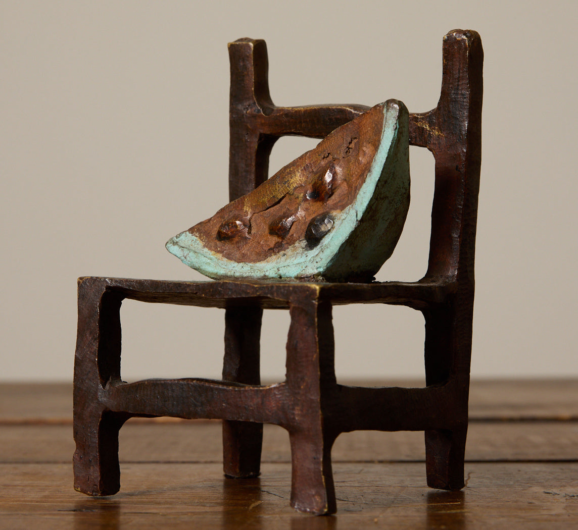 BRONZE SCULPTURE STUDY OF WATERMELON ON CHAIR