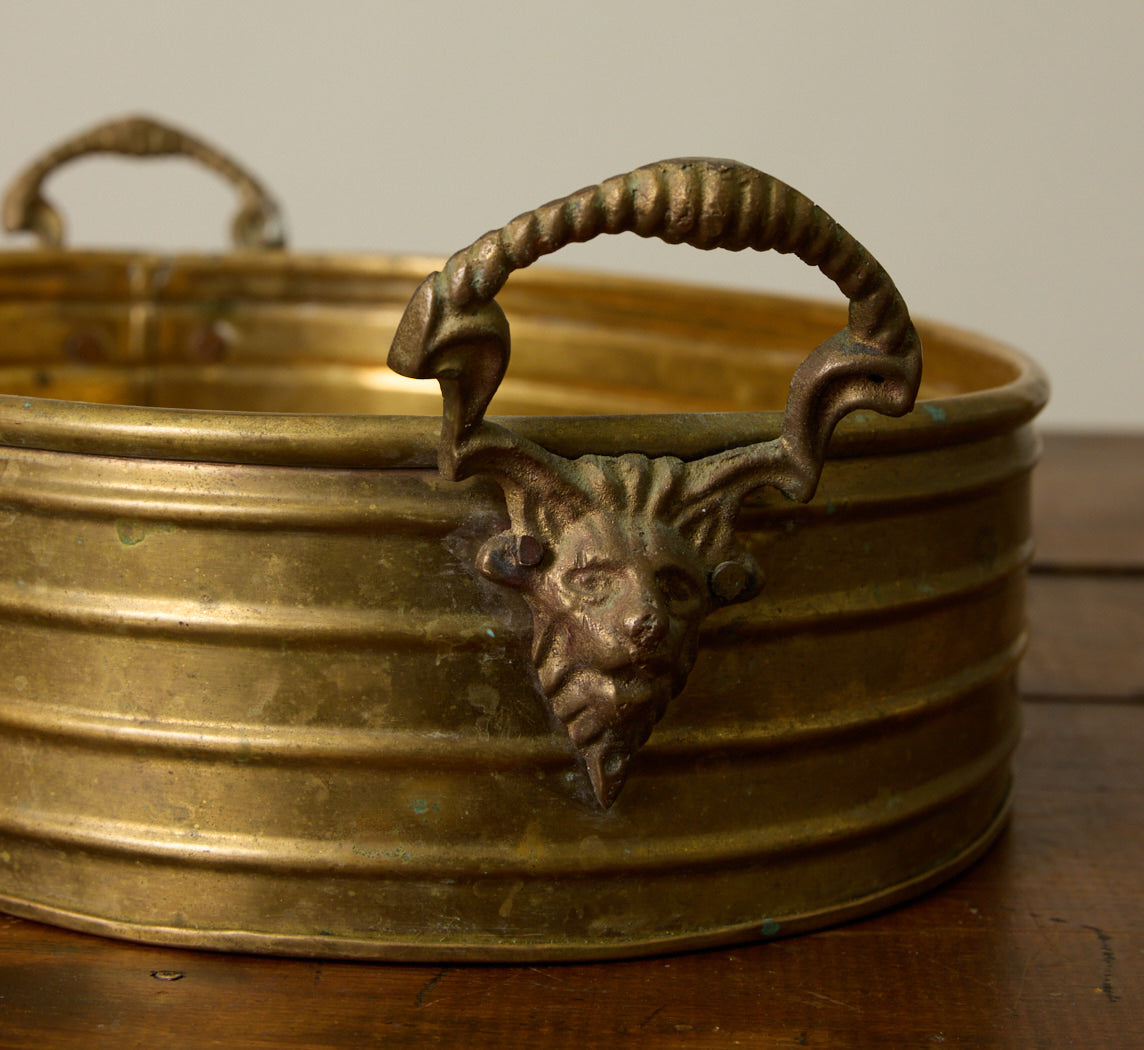 EARLY 20TH CENTURY BRASS JARDINIERE WITH LION'S HEAD HANDLES