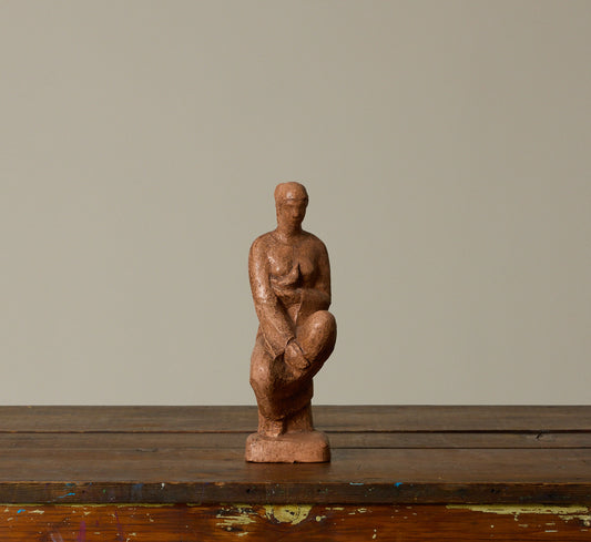 CERAMIC SEATED WOMAN FIGURE