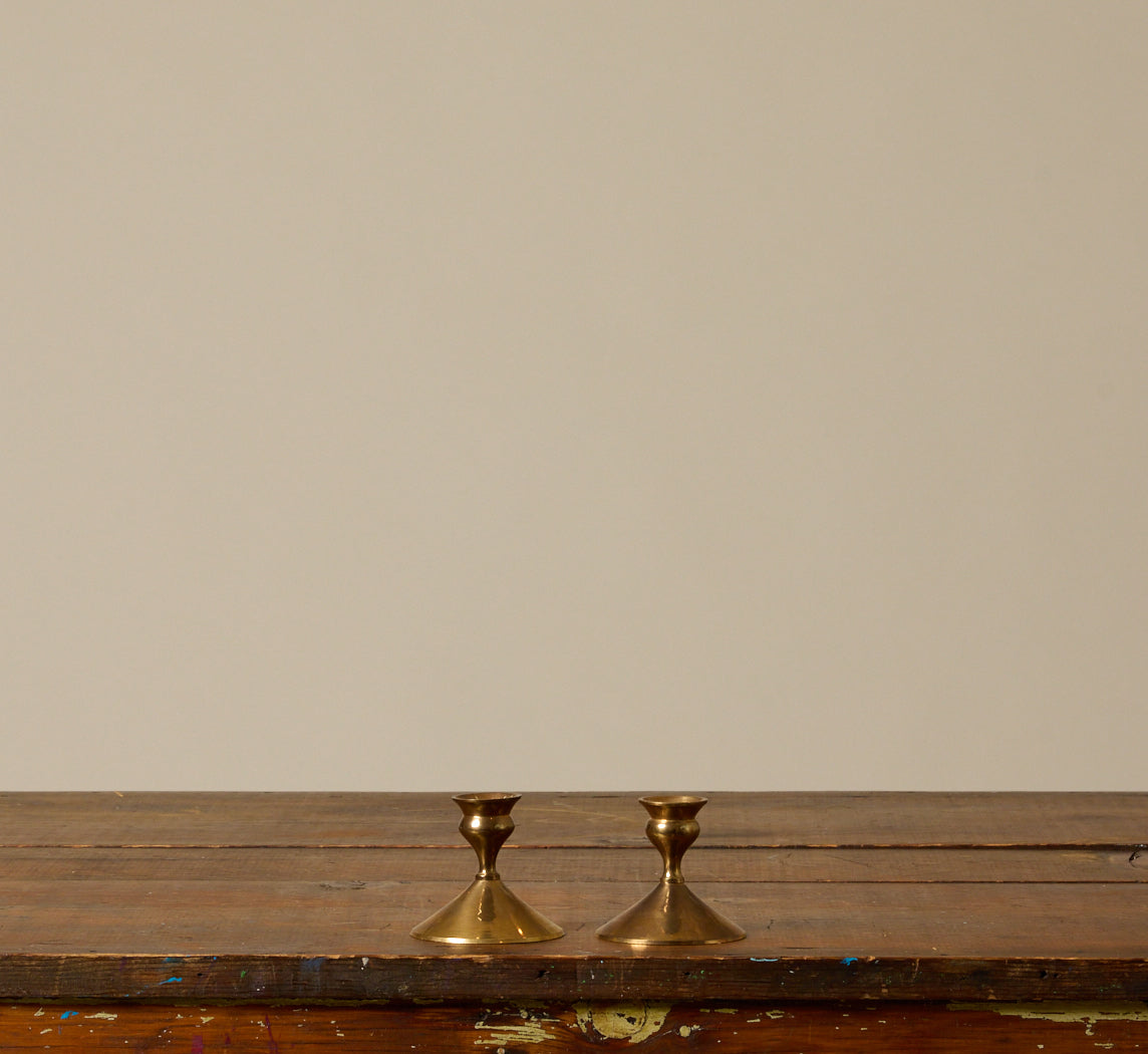 PAIR OF MIDCENTURY FLARED BRASS CANDLESTICK HOLDERS