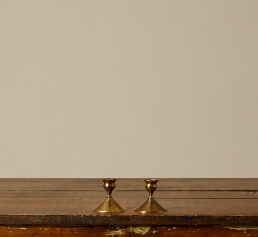 PAIR OF MIDCENTURY FLARED BRASS CANDLESTICK HOLDERS