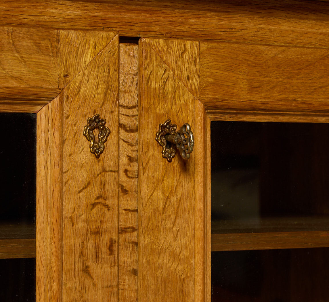 1970'S DANISH OAK SIDE BOARD WITH GLASS  DOORS IN THE MANNER OF HENNING KJÆRNULF