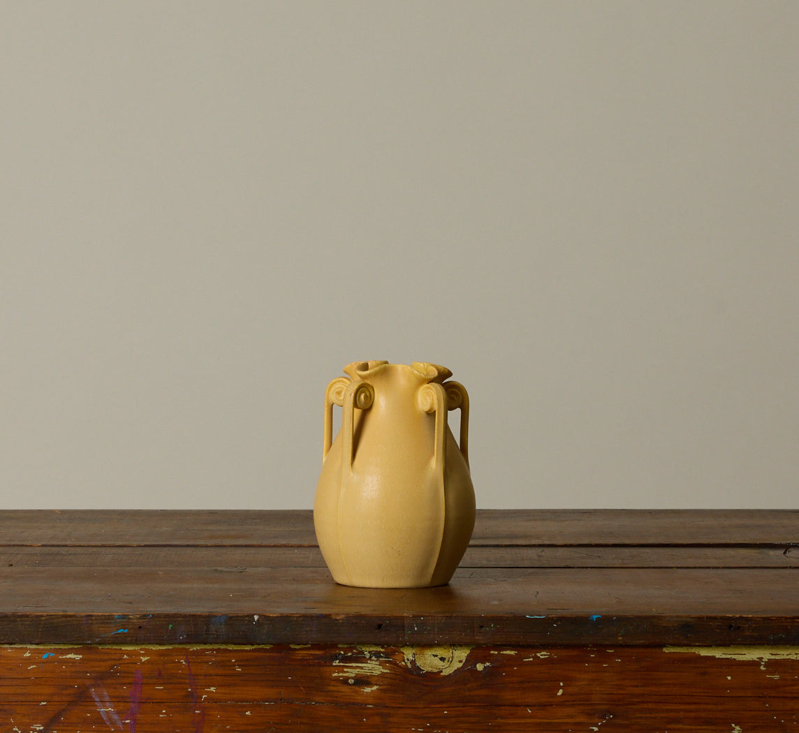 YELLOW FIDDLEHEAD POTTERY VASE