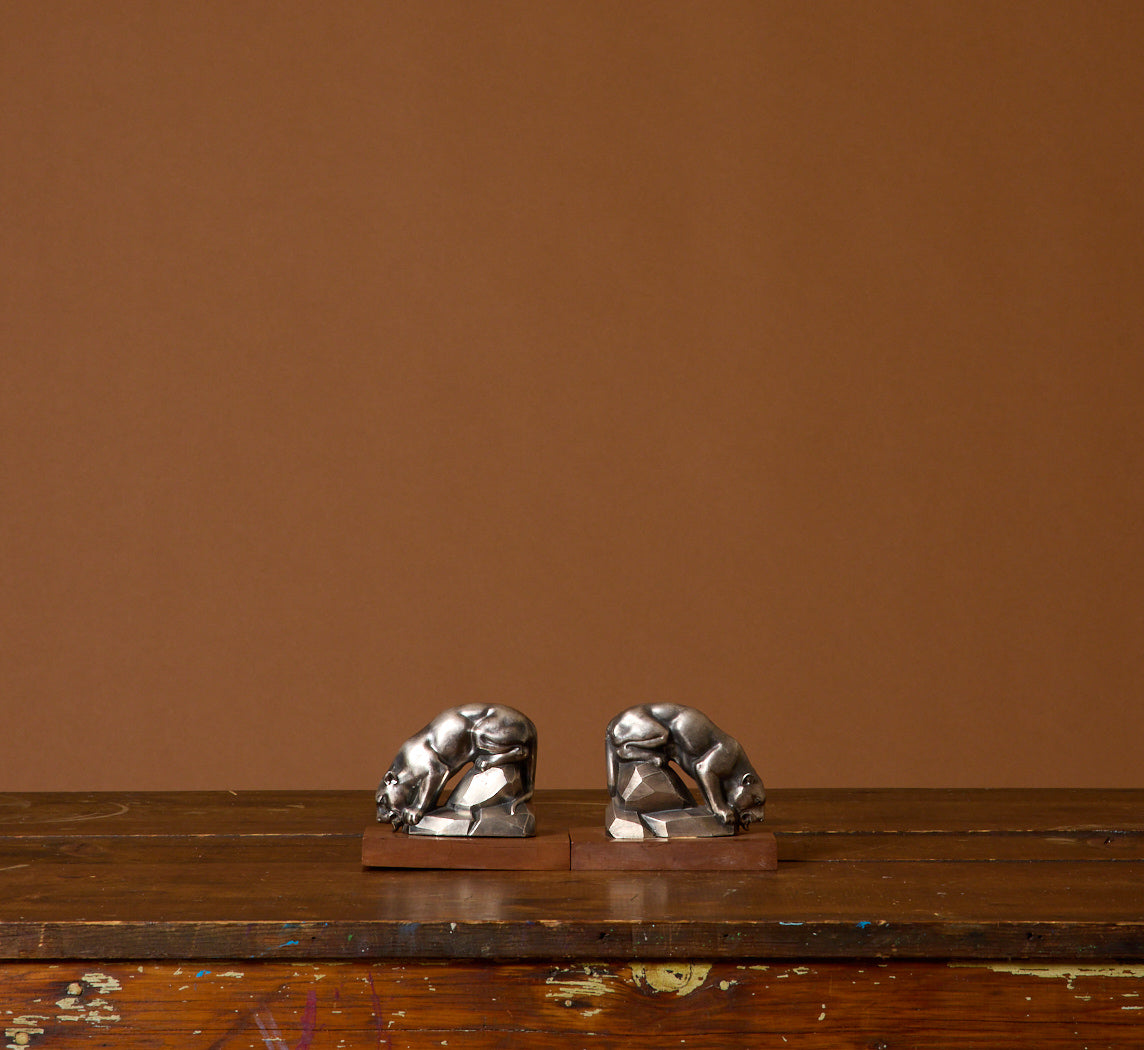 PAIR OF 1930S DRINKING PANTHER BOOKENDS