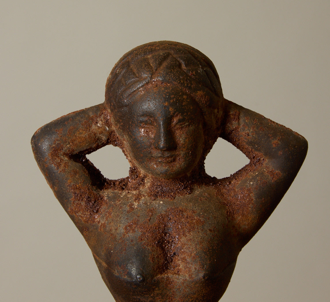 19TH CENTURY CAST IRON "NAUGHTY NELLIE" FIGURINE