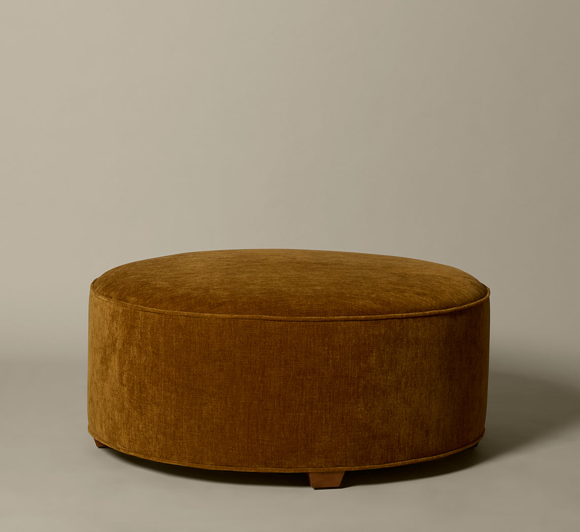 PIERCE & WARD CIRCLE OTTOMAN IN HONEY CHENILLE