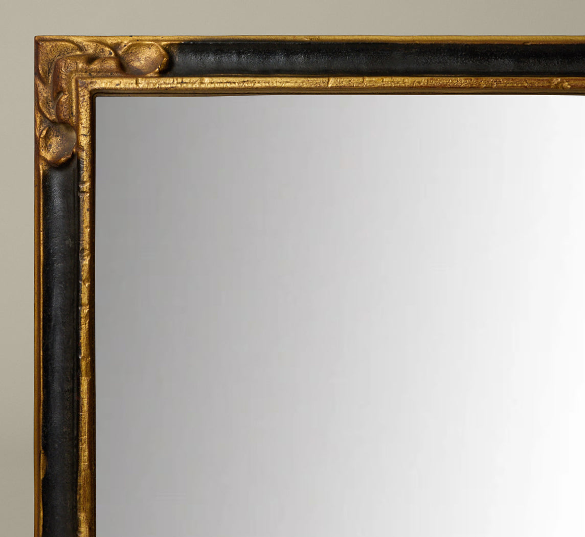 ITALIAN EMPIRE-STYLE EBONY AND GILT MIRROR