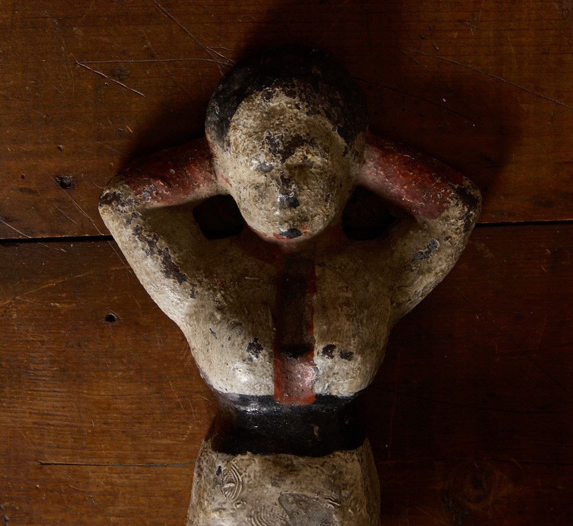 19TH CENTURY CAST IRON PAINTED "NAUGHTY NELLIE" FIGURINE