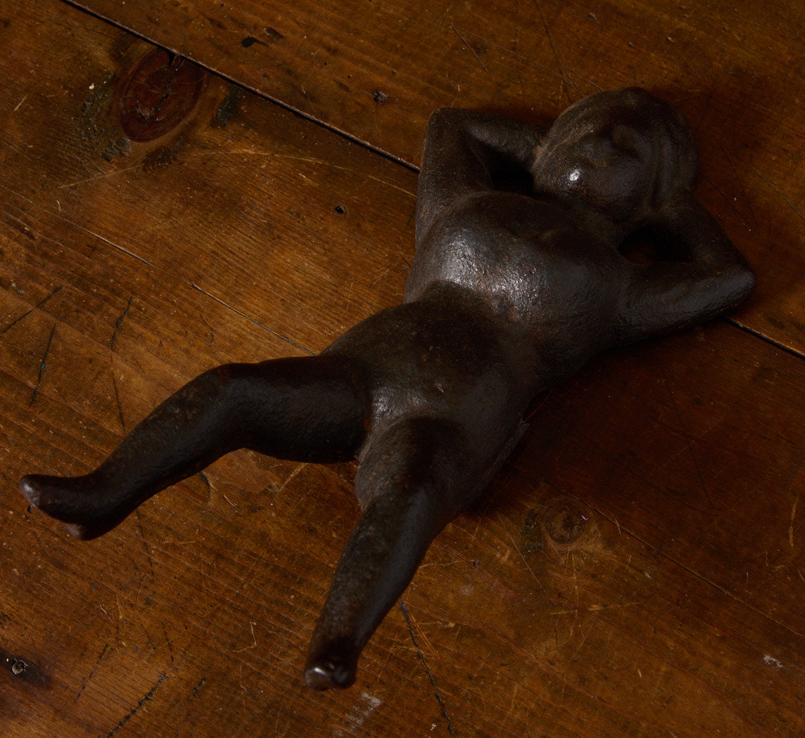 19TH CENTURY CAST IRON "NAUGHTY NELLIE" FIGURINE