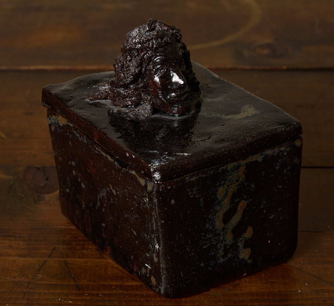 BLACK CERAMIC FIGURE BOX WITH BUST